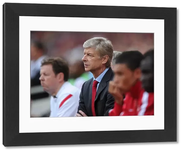 Arsene Wenger and Arsenal Face Off Against Bolton Wanderers in Premier League Clash (2011-12)