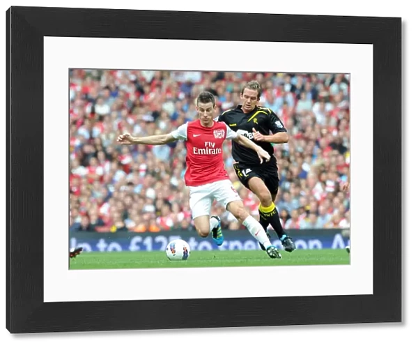 Laurent Koscielny (Arsenal) Kevin Davies (Bolton). Arsenal 3: 0 Bolton Wanderers