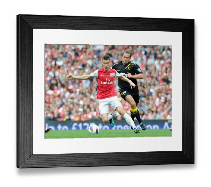 Framed Print : Laurent Koscielny (Arsenal) Kevin Davies (Bolton). Arsenal 3: 0 Bolton Wanderers Framed Print : Laurent Koscielny (Arsenal) Kevin Davies (Bolton). Arsenal 3: 0 Bolton Wanderers