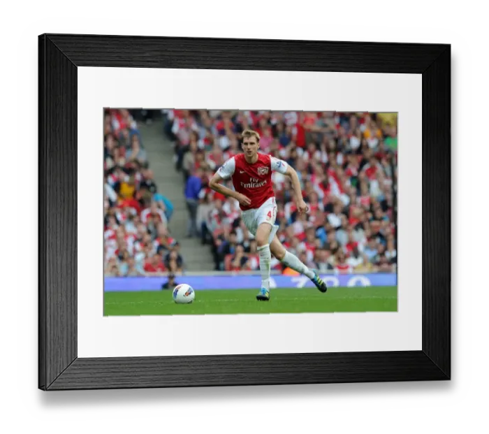 Framed Print : Arsenal's Dominant Victory: Per Mertesacker Scores in 3-0 Win over Bolton Wanderers (Premier League, 2011) Framed Print : Arsenal's Dominant Victory: Per Mertesacker Scores in 3-0 Win over Bolton Wanderers (Premier League, 2011)