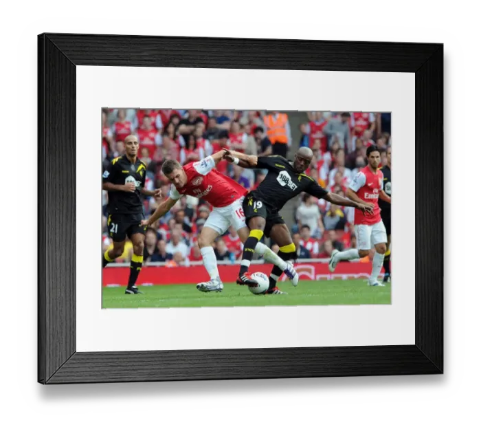 Framed Print : Arsenal Thrash Bolton 3-0: Ramsey Shines in Emirates Victory Framed Print : Arsenal Thrash Bolton 3-0: Ramsey Shines in Emirates Victory