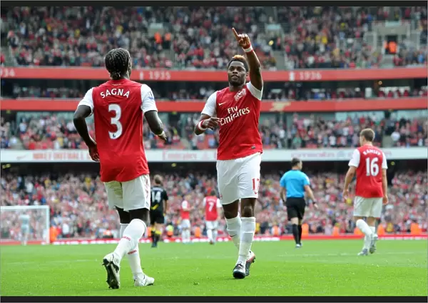 Arsenal's Triumph: Alex Song and Bacary Sagna Celebrate 3-0 Over Bolton Wanderers