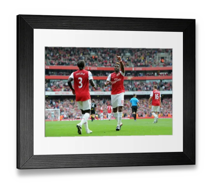 Framed Print : Arsenal's Triumph: Alex Song and Bacary Sagna Celebrate 3-0 Over Bolton Wanderers