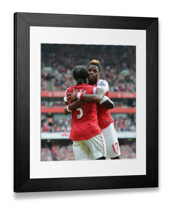 Framed Print : Alex Song and Bacary Sagna: Arsenal's Unstoppable Duo Celebrate 3-0 Over Bolton Wanderers