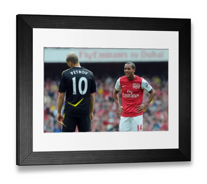 Framed Print : Theo Walcott (Arsenal) Martin Petrov (Bolton). Arsenal 3: 0 Bolton Wanderers Framed Print : Theo Walcott (Arsenal) Martin Petrov (Bolton). Arsenal 3: 0 Bolton Wanderers