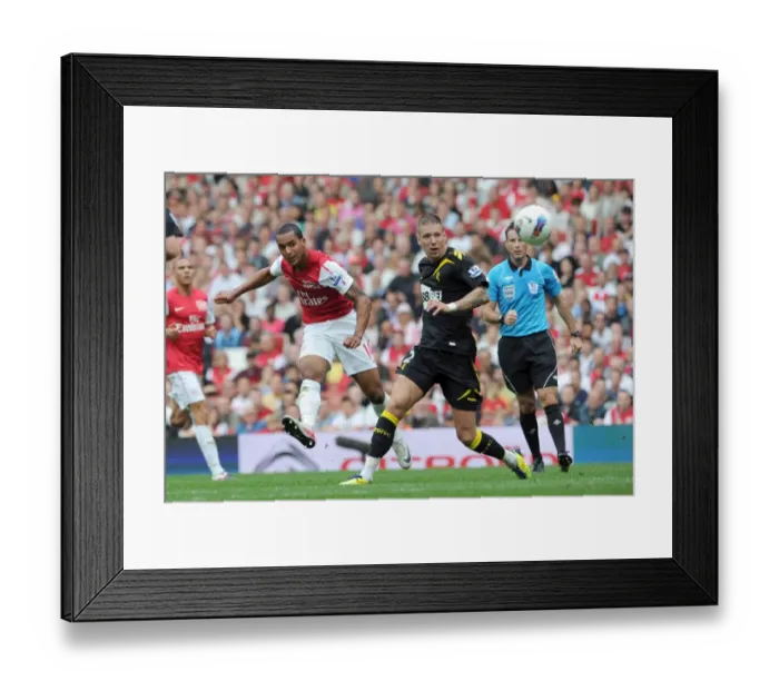 Framed Print : Theo Walcott's Hat-Trick: Arsenal Dominates Bolton Wanderers 3-0 in Premier League Framed Print : Theo Walcott's Hat-Trick: Arsenal Dominates Bolton Wanderers 3-0 in Premier League