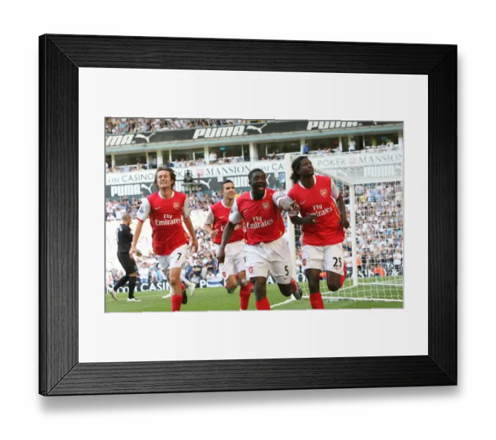 Framed Print : Arsenal's Triumphant Moment: Adebayor's Stunner Seals 1-3 Victory Over Tottenham (15 / 9 / 07)