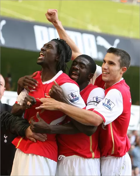 Triumphant Trio: Adebayor, Toure, and van Persie Celebrate Arsenal's First Goal Against Tottenham (15 / 9 / 07)