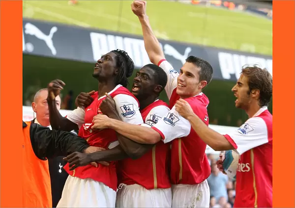 Emmanuel Adebayor (Arsenal) celebrates scoring the 1st Arsenal goal with Kolo Toure