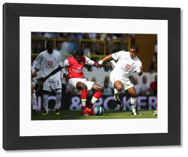 Emmanuel Adebayor (Arsenal) Tom Huddlestone (Tottenham)
