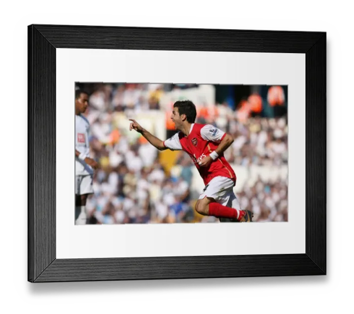 Framed Print : Fabregas's Brilliant Strike: Arsenal Triumphs 3-1 over Tottenham in FA Premier League Framed Print : Fabregas's Brilliant Strike: Arsenal Triumphs 3-1 over Tottenham in FA Premier League