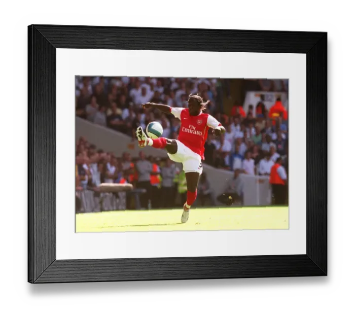 Framed Print : Bacary Sagna's Dominant Performance: Arsenal Crushes Tottenham 1-3 in FA Premier League (September 15, 2007)
