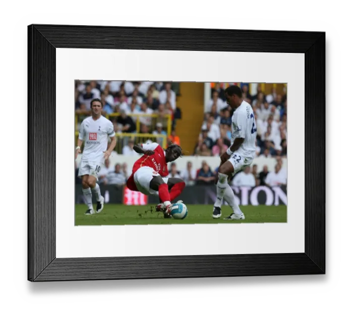 Framed Print : Bacary Sagne (Arsenal) Tom Huddlestone (Tottenham)