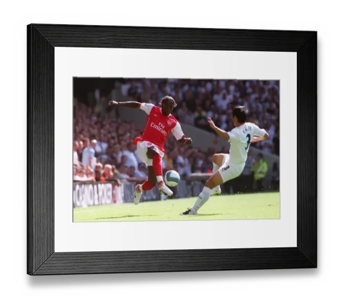 Framed Print : Triumphant Rivals: Sagna's Double Strike Against Lee Young-Pyo and Tottenham
