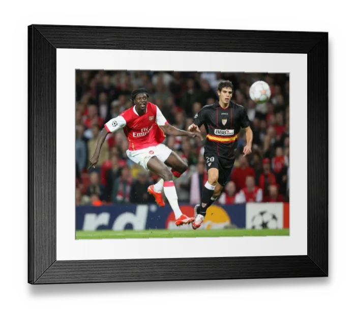 Framed Print : Emmauel Adebayor (Arsenal) Federico Fazio (Sevilla)