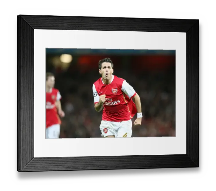 Framed Print : Cesc Fabregas's Thrilling Debut Goal: Arsenal's 3-0 Champions League Victory over Sevilla (07 / 09 / 07)