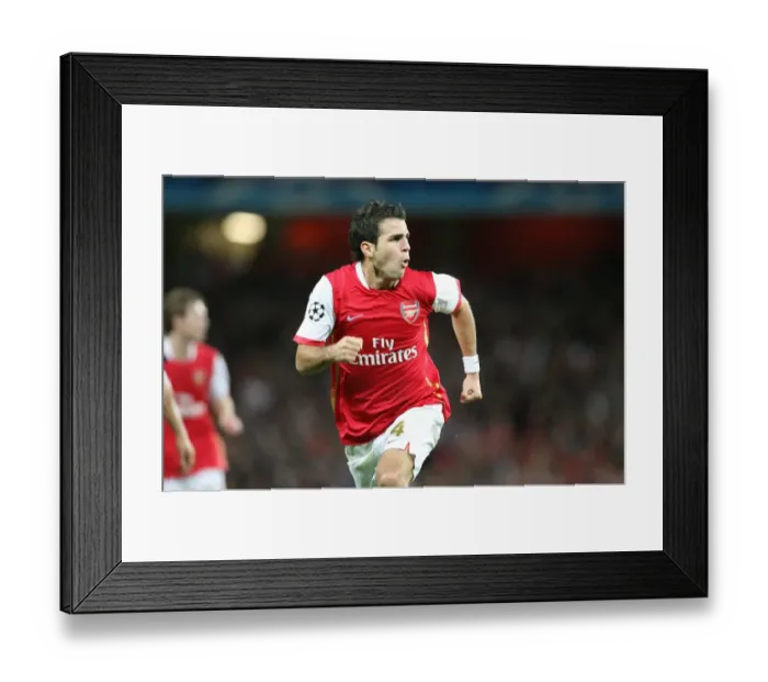 Framed Print : Cesc Fabregas Euphoric Moment: Arsenal's Historic First Goal vs Sevilla (3:0) - UEFA Champions League, 2007