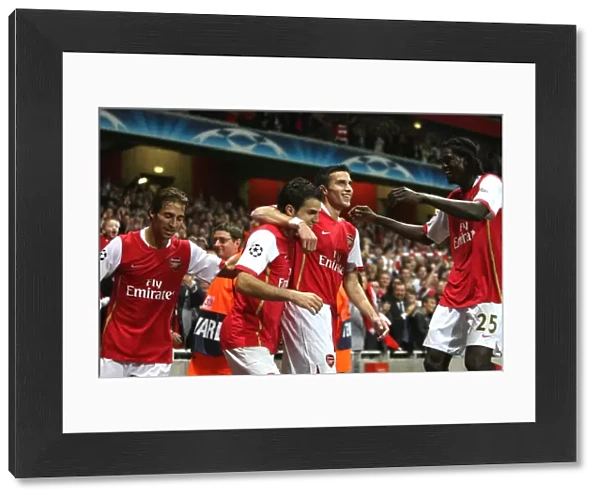 Cesc Fabregas, Robin van Persie celebrate the 1st Arsenal goal