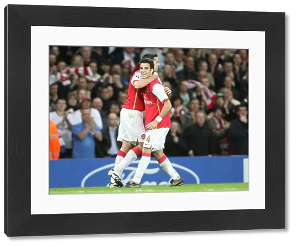 Robin van Persie celebrates scoring Arsenals 2nd goal with Cesc Fabregas