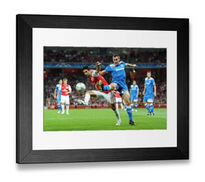 Framed Print : Arsenal vs Olympiacos: Mikel Arteta's Leadership Lifts Arsenal to 2-1 Victory in UEFA Champions League Group F Framed Print : Arsenal vs Olympiacos: Mikel Arteta's Leadership Lifts Arsenal to 2-1 Victory in UEFA Champions League Group F