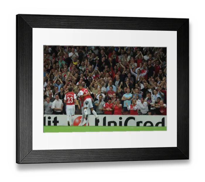 Framed Print : Arsenal Fans Celebrate Alex Oxlade-Chamberlain's Goal vs Olympiacos (2011-12)