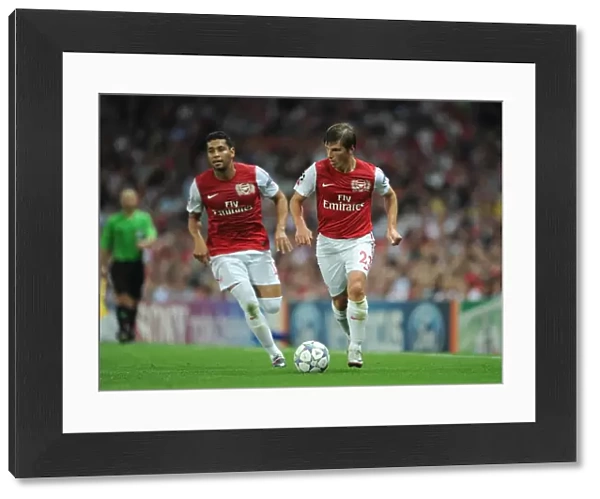 Andrey Arshavin and Andre Santos (Arsenal). Arsenal 2: 1 Olympiacos. UEFA Champions League