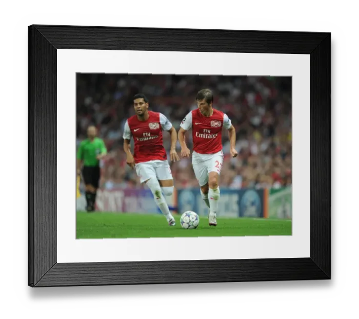 Framed Print : Andrey Arshavin and Andre Santos (Arsenal). Arsenal 2: 1 Olympiacos. UEFA Champions League