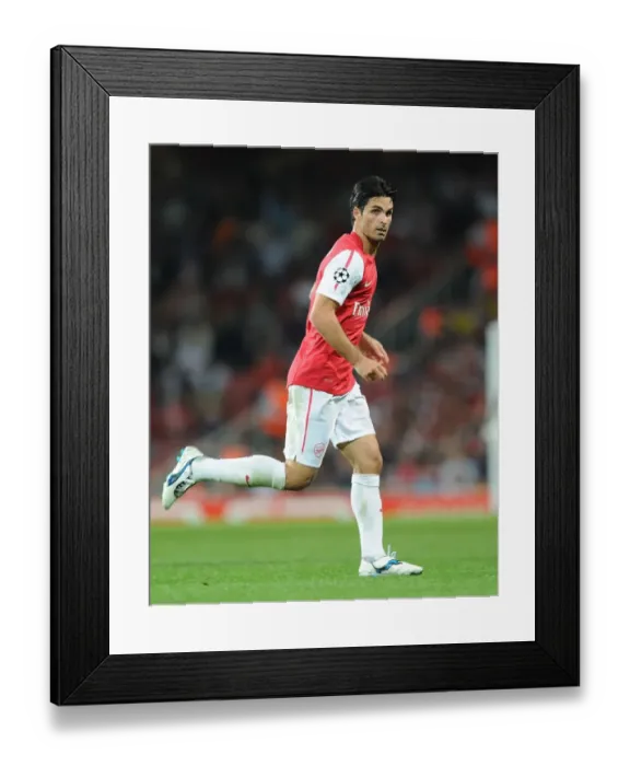 Framed Print : Mikel Arteta Leads Arsenal Against Olympiacos in Champions League Showdown (2011)