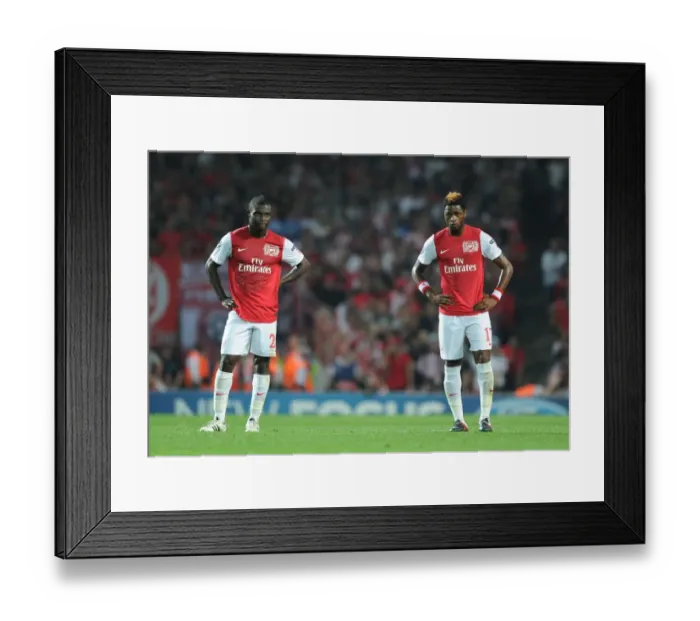 Framed Print : Arsenal FC vs. Olympiacos FC: Frimpong and Song in Action during the 2011-12 UEFA Champions League Match Framed Print : Arsenal FC vs. Olympiacos FC: Frimpong and Song in Action during the 2011-12 UEFA Champions League Match