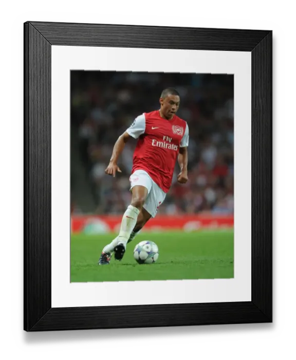 Framed Print : Arsenal's Oxlade-Chamberlain Shines in Champions League Clash Against Olympiacos (2011-12)
