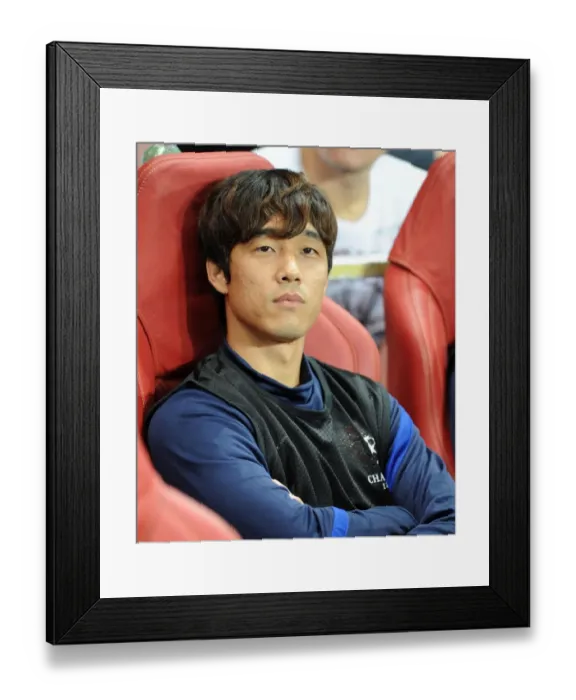 Framed Print : Arsenal vs Olympiacos: Arsenal Takes a 2:1 Lead in UEFA Champions League Group F at Emirates Stadium Framed Print : Arsenal vs Olympiacos: Arsenal Takes a 2:1 Lead in UEFA Champions League Group F at Emirates Stadium
