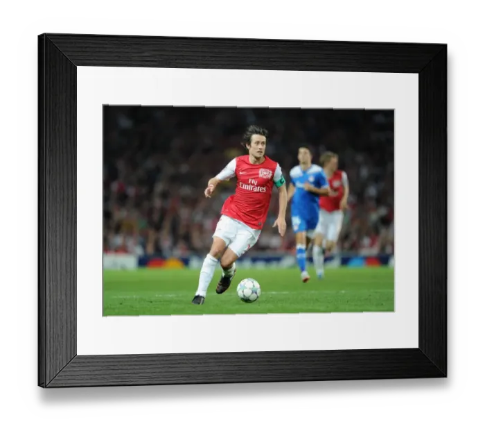 Framed Print : Tomas Rosicky (Arsenal). Arsenal 2: 1 Olympiacos. UEFA Champions League