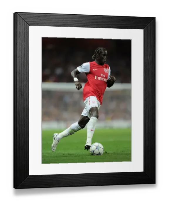 Framed Print : Arsenal's Bacary Sagna Scores Dramatic Winner Against Olympiacos in UEFA Champions League Group F at Emirates Stadium (2011-12) Framed Print : Arsenal's Bacary Sagna Scores Dramatic Winner Against Olympiacos in UEFA Champions League Group F at Emirates Stadium (2011-12)