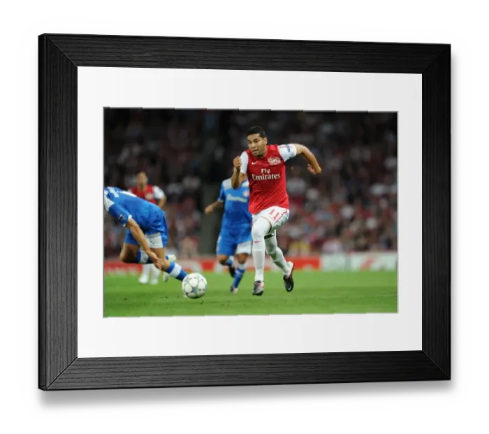 Framed Print : Arsenal Triumph Over Olympiacos: Andre Santos Scores the Winner in Champions League Group F Clash at Emirates Stadium (2011-12)