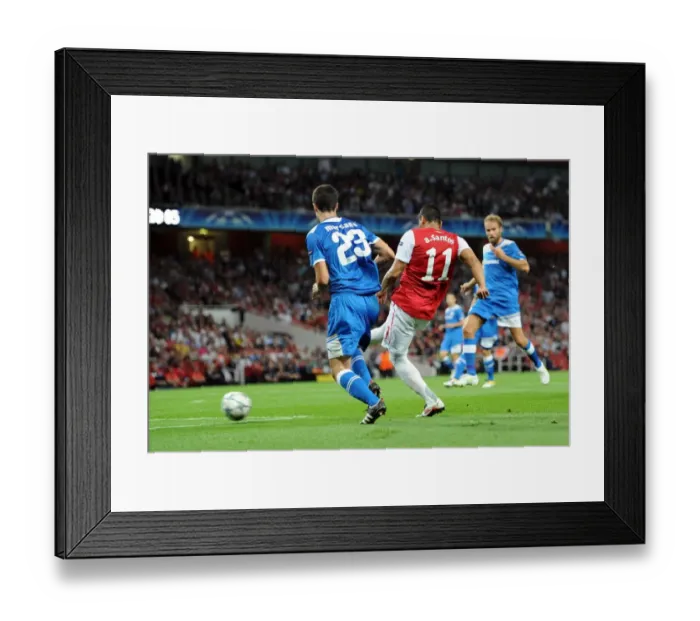 Framed Print : Andre Santos Scores Arsenal's Second Goal Against Olympiacos in UEFA Champions League: Arsenal 2-1, Group F Framed Print : Andre Santos Scores Arsenal's Second Goal Against Olympiacos in UEFA Champions League: Arsenal 2-1, Group F