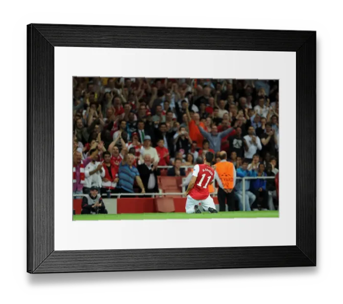 Framed Print : Andre Santos celebrates scoring Arsenals 2nd goal. Arsenal 2: 1 Olympiacos