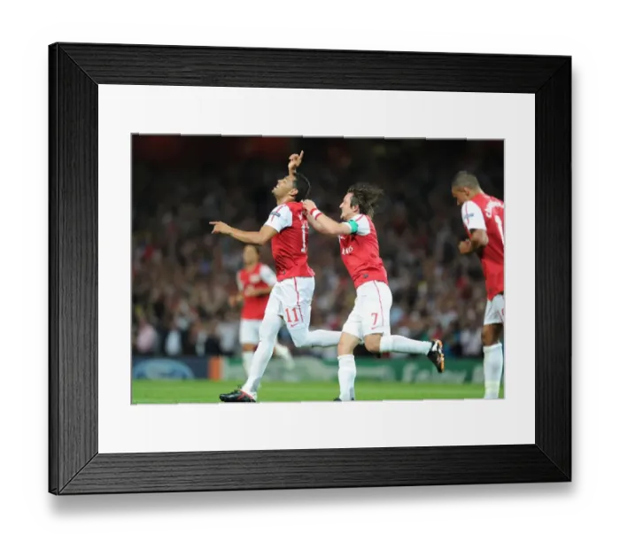 Framed Print : Arsenal's Double Act: Rosicky and Santos Score in Champions League Victory over Olympiacos (2011-12) Framed Print : Arsenal's Double Act: Rosicky and Santos Score in Champions League Victory over Olympiacos (2011-12)