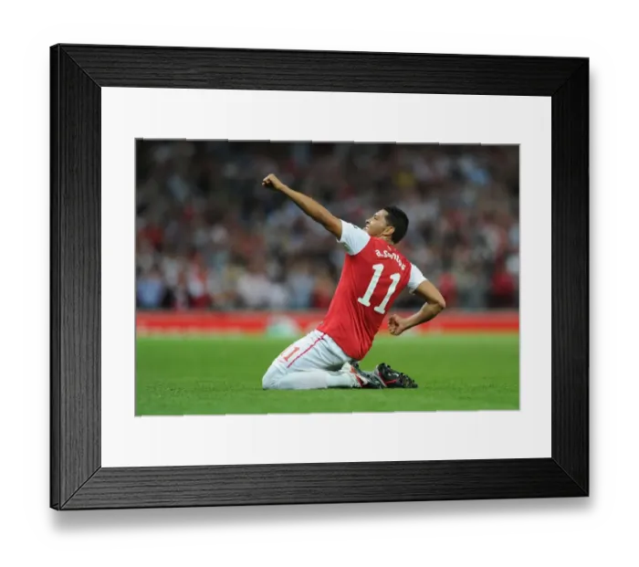 Framed Print : Arsenal Celebrates Second Goal Against Olympiacos in 2011-12 UEFA Champions League
