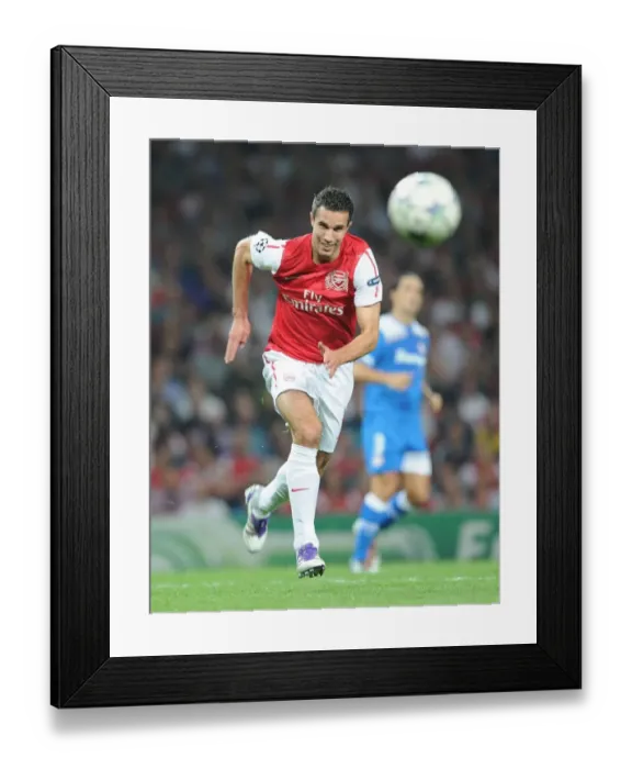 Framed Print : Robin van Persie in Action: Arsenal vs. Olympiacos, UEFA Champions League 2011-12 Framed Print : Robin van Persie in Action: Arsenal vs. Olympiacos, UEFA Champions League 2011-12
