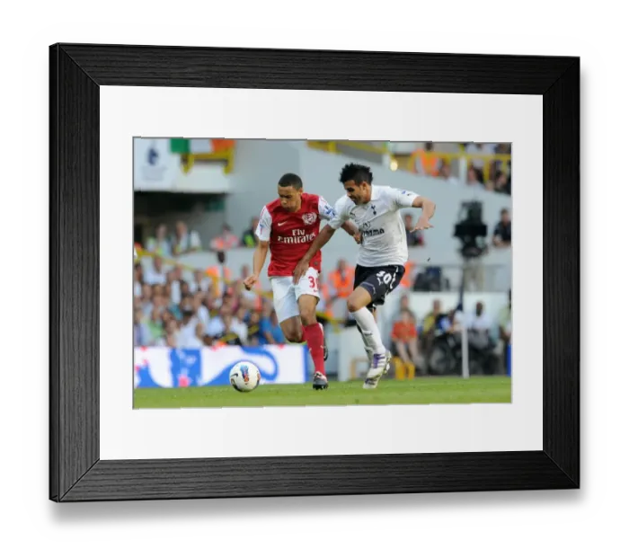 Framed Print : Coquelin vs. Sandro: A Pivotal Battle - Tottenham Hotspur's 2-1 Victory over Arsenal in the Premier League (2011-12)