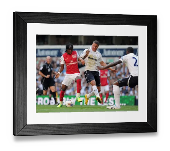 Framed Print : Gervinho vs. Kyle Walker: A Tight Battle in the 2011-12 Premier League - Arsenal Trail Tottenham 2:1 Framed Print : Gervinho vs. Kyle Walker: A Tight Battle in the 2011-12 Premier League - Arsenal Trail Tottenham 2:1
