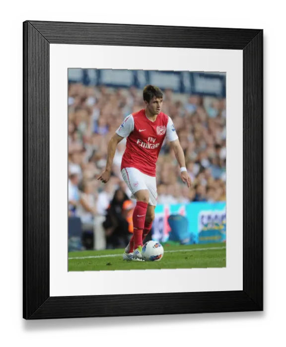 Framed Print : Carl Jenkinson in Action: Tottenham Hotspur Edge Past Arsenal 2-1 in Premier League Clash