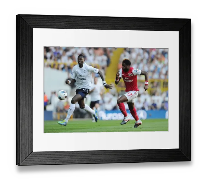 Framed Print : Arsenal's Alex Song vs. Tottenham's Emmanuel Adebayor: A Rivalry Renewed in the 2011-12 Premier League Clash at White Hart Lane (2:1 in Spurs Favor)