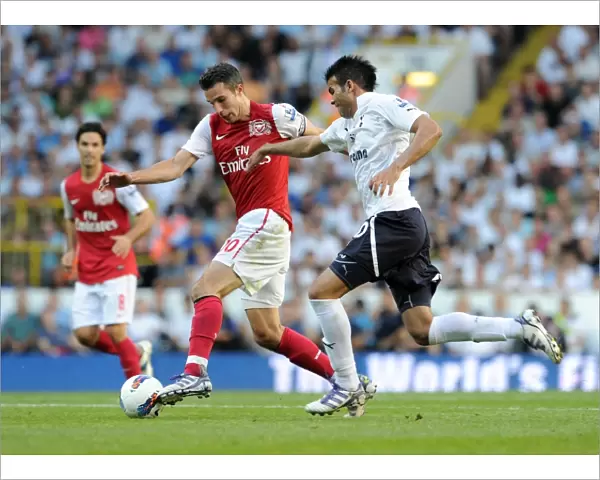 Robin van Persie (Arsenal) Sandro (Tottenham). Tottenham Hotspur 2: 1 Arsenal
