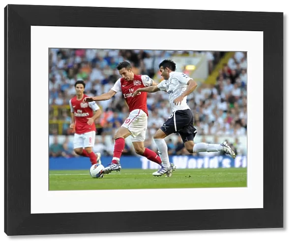Robin van Persie (Arsenal) Sandro (Tottenham). Tottenham Hotspur 2: 1 Arsenal