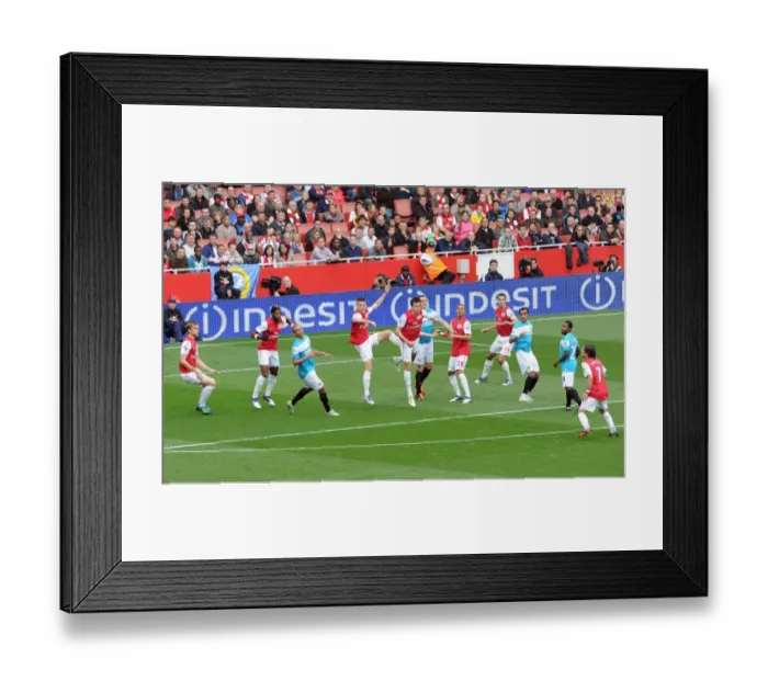 Framed Print : Laurent Koscielny (Arsenal) heads the ball clear. Arsenal 2: 1 Sunderland Framed Print : Laurent Koscielny (Arsenal) heads the ball clear. Arsenal 2: 1 Sunderland