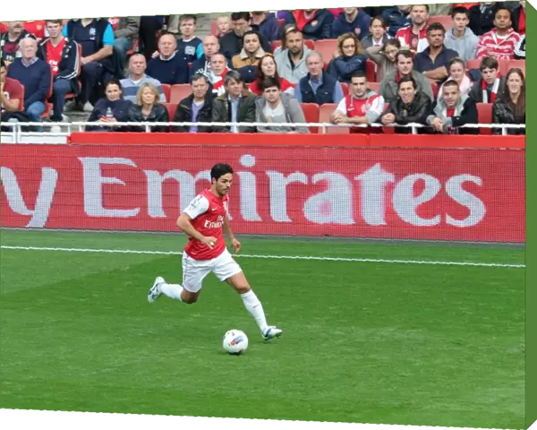 Mikel Arteta (Arsenal) runs in front of the Fly Emirates Board. Arsenal 2: 1 Sunderland