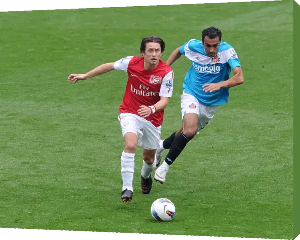 Tomas Rosicky (Arsenal) Ahmed Elmohamady (Sunderland). Arsenal 2: 1 Sunderland