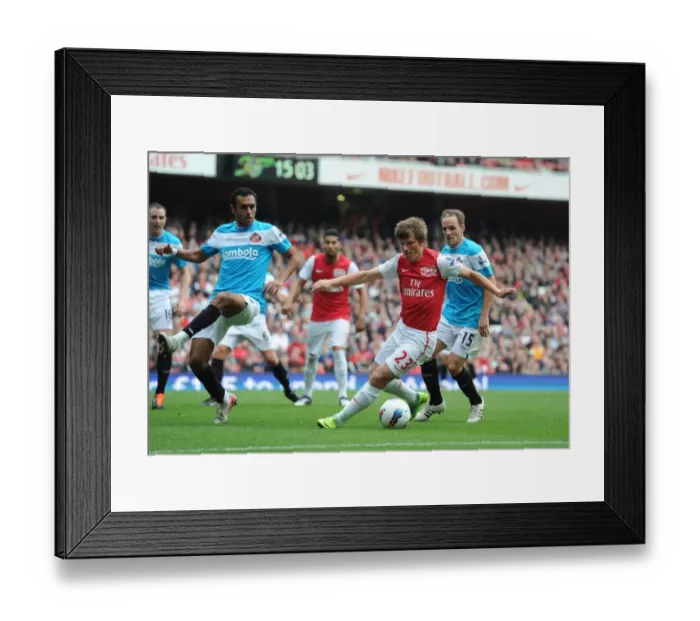 Framed Print : Arsenal vs. Sunderland: Andrey Arshavin Clashes with Defenders in 2011-12 Premier League Match Framed Print : Arsenal vs. Sunderland: Andrey Arshavin Clashes with Defenders in 2011-12 Premier League Match
