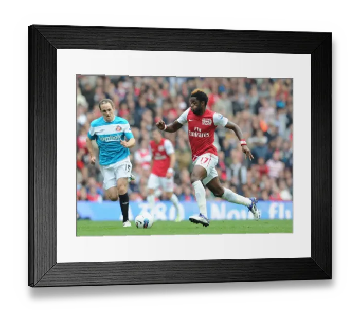 Framed Print : Arsenal's Alex Song Surges Past Sunderland's David Vaughan in 2011-12 Premier League Clash Framed Print : Arsenal's Alex Song Surges Past Sunderland's David Vaughan in 2011-12 Premier League Clash